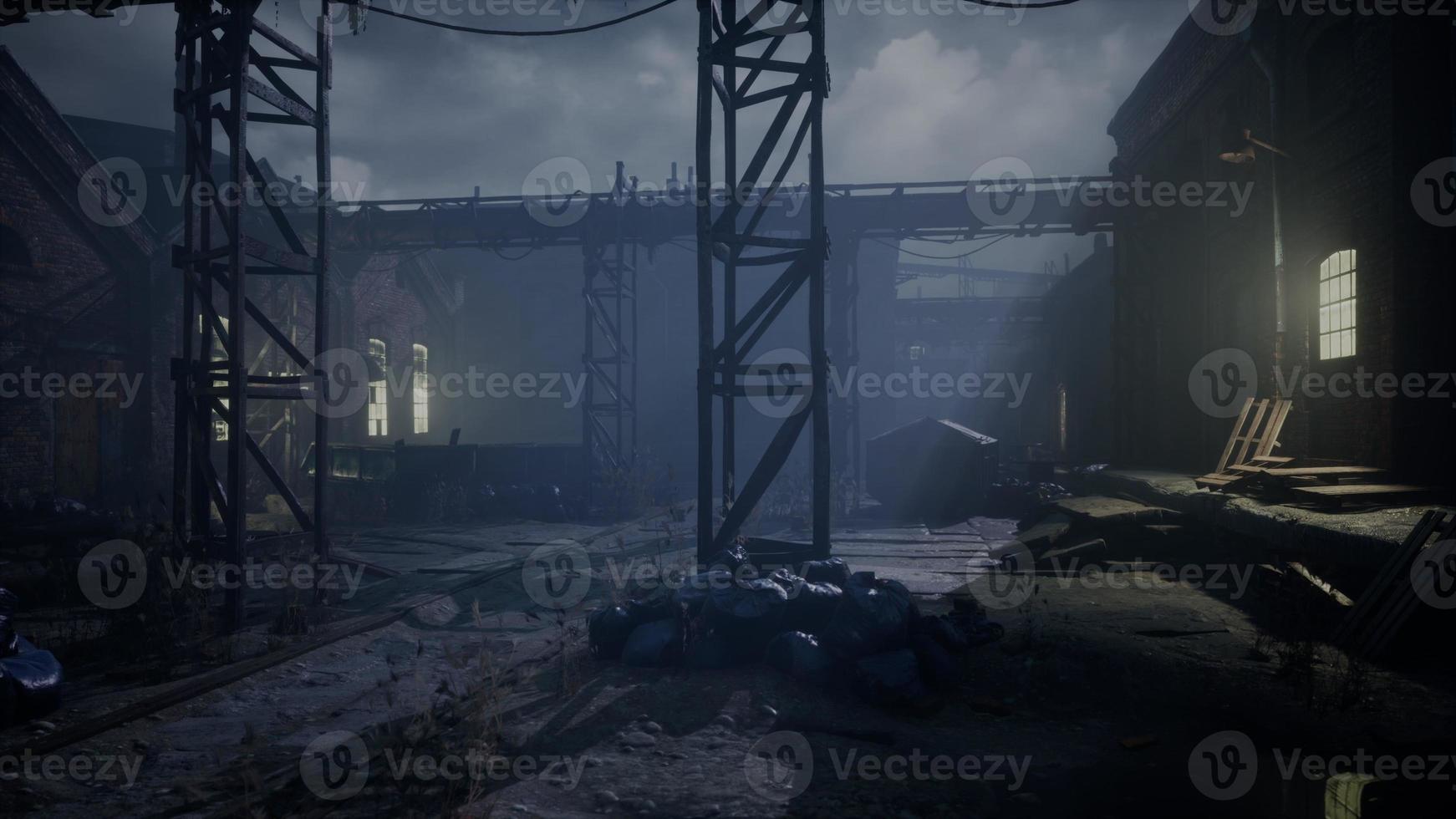 frightening abandoned factory at night photo