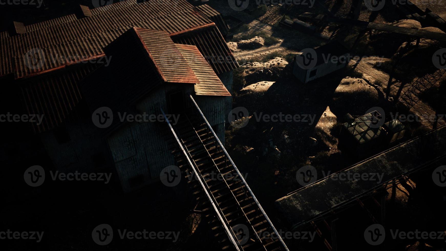 High above an industrial factory in the desert photo