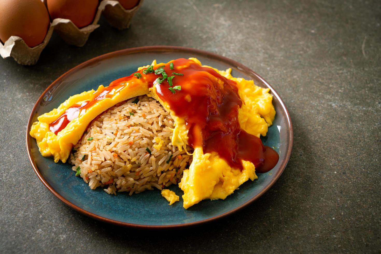 Flavored Fried Rice in an Omelet Wrapping photo