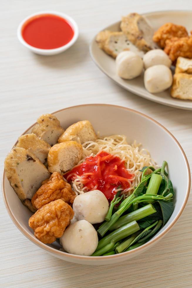 egg noodles with fish balls and shrimp balls in pink sauce, Yen Ta Four or Yen Ta Fo photo
