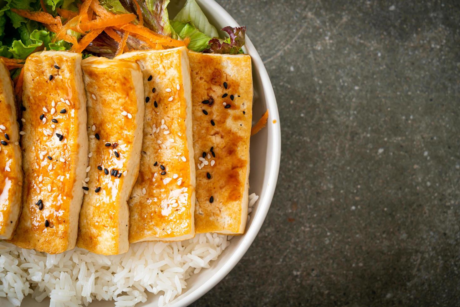 teriyaki tofu rice bowl - vegan food style photo