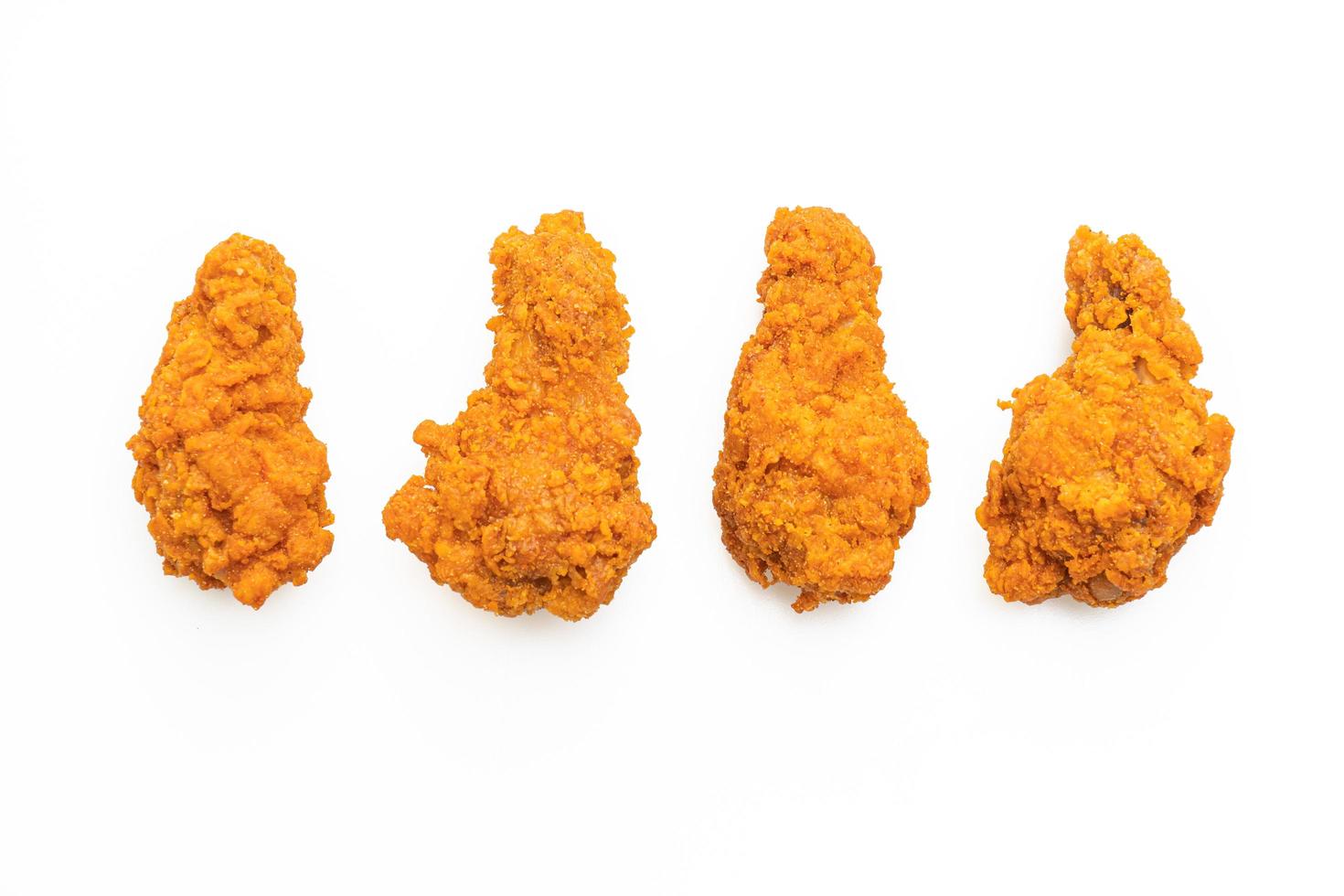 fried spicy chicken on white background photo