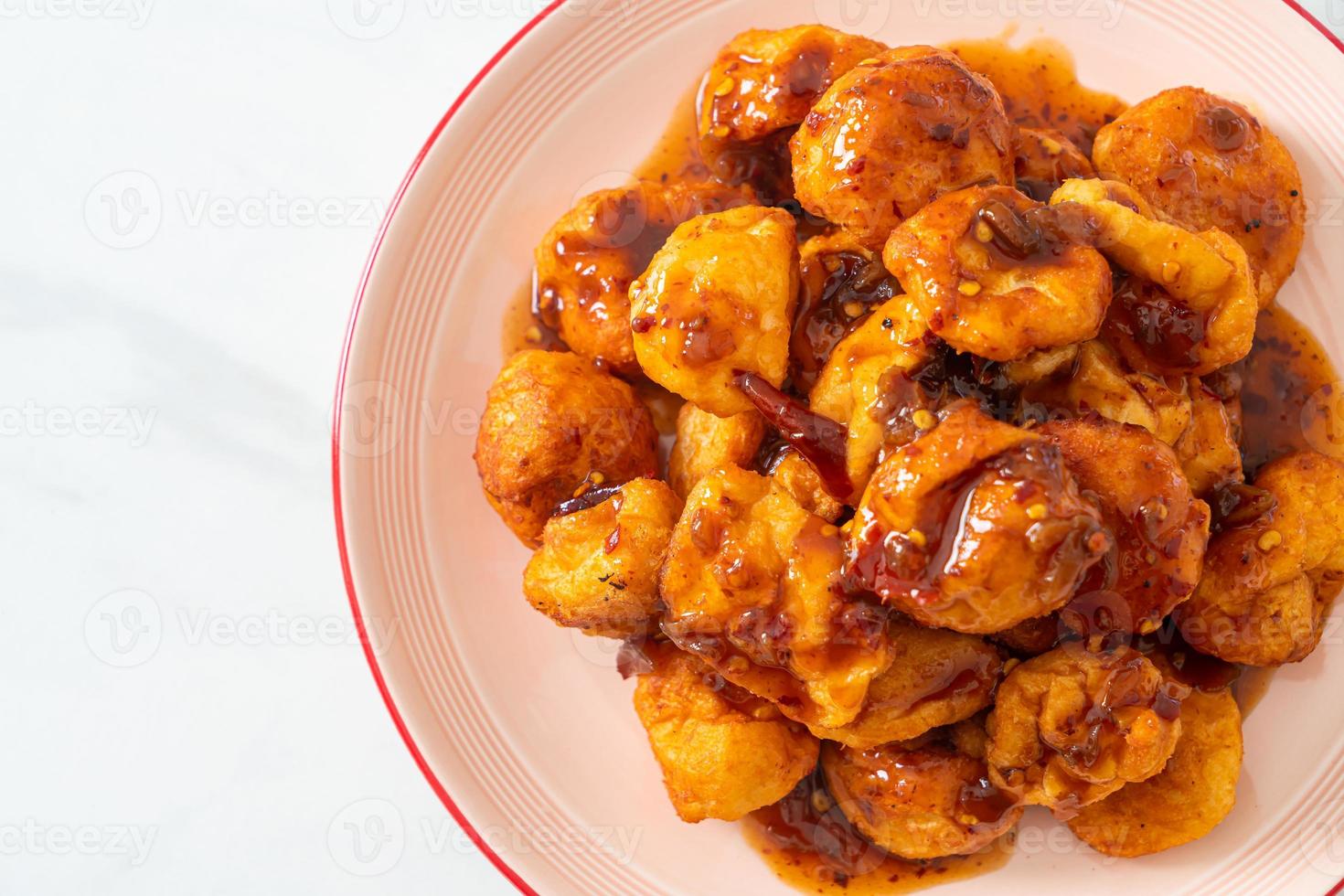 fried meatballs with spicy dipping sauce photo