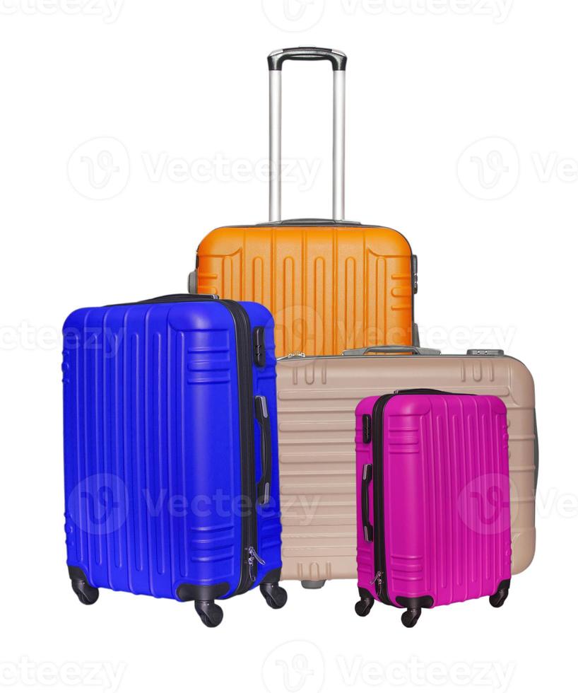 Colored suitcases on white background. photo