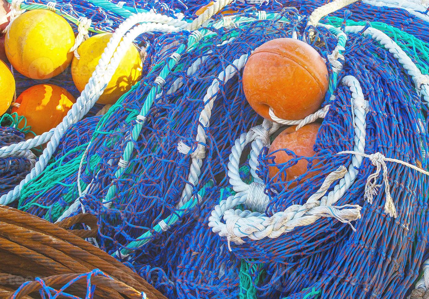 The colored fishing net with floats. photo