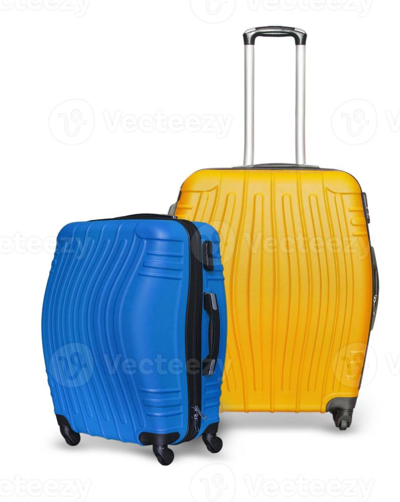 Colored suitcases on white background. photo