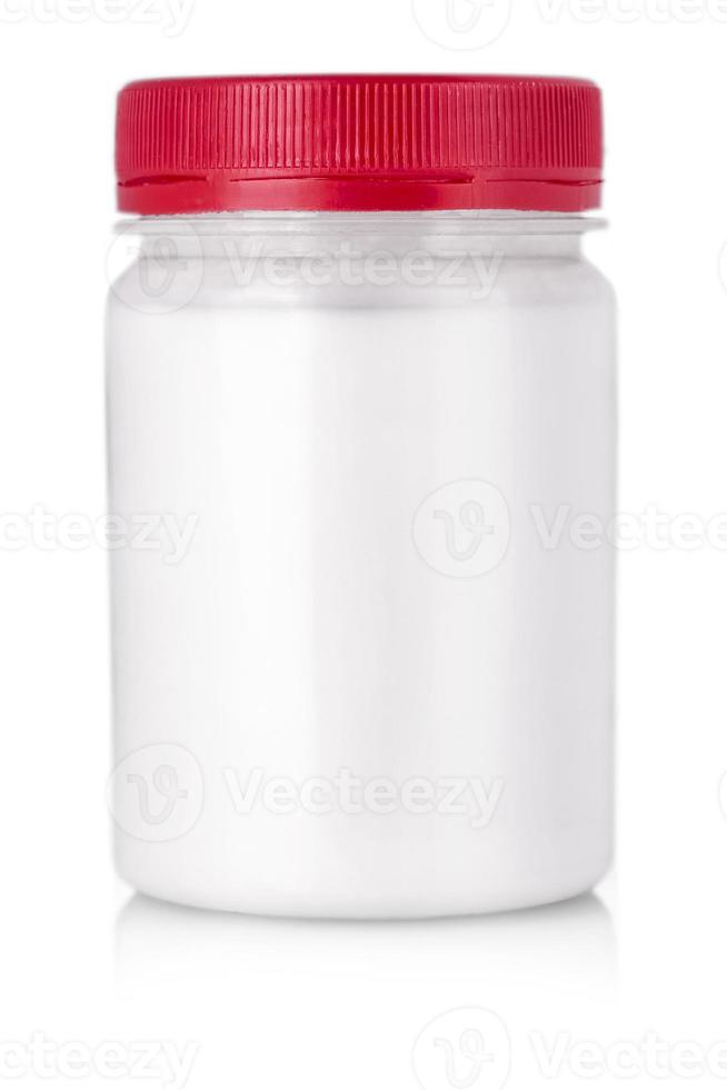 white jar with red cap without label on a white background. photo