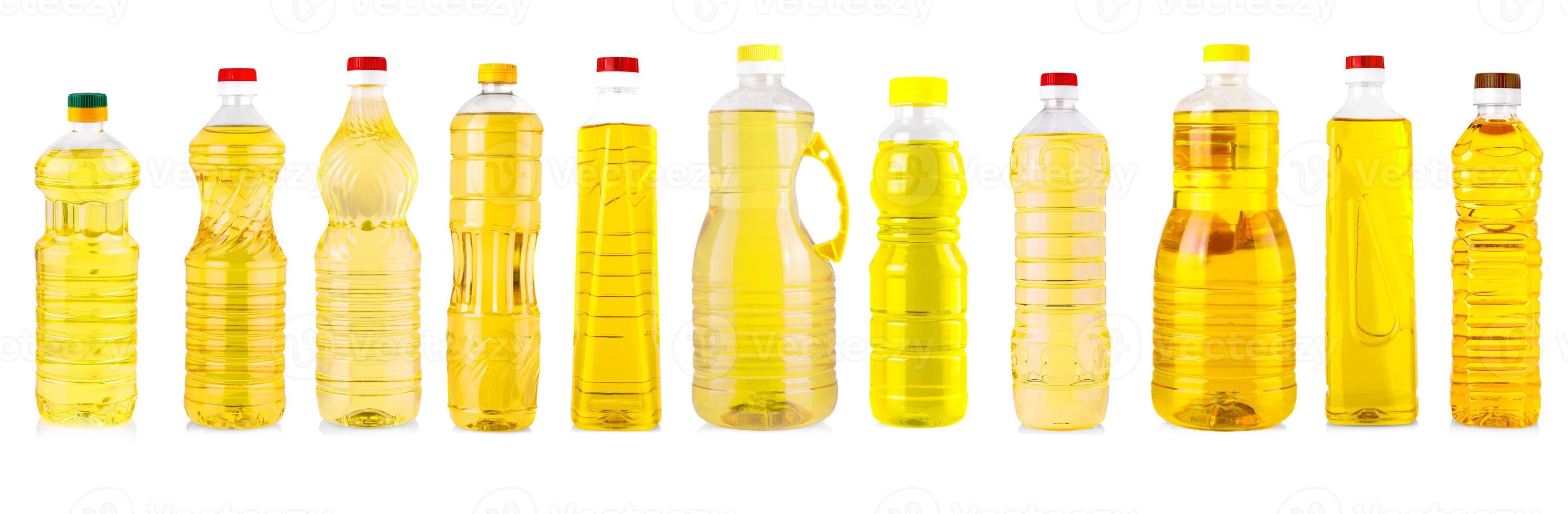 Set of Bottles of sunflower oil isolated on white photo