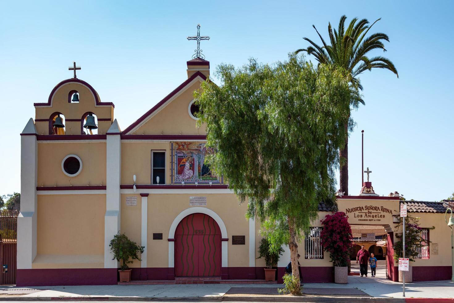 LOS ANGELES, CALIFORNIA, USA, 2011.  Our Lady Queen of Angels Catholic Church in Los Angeles, California, USA on August 10, 2011. Two unidentified people photo