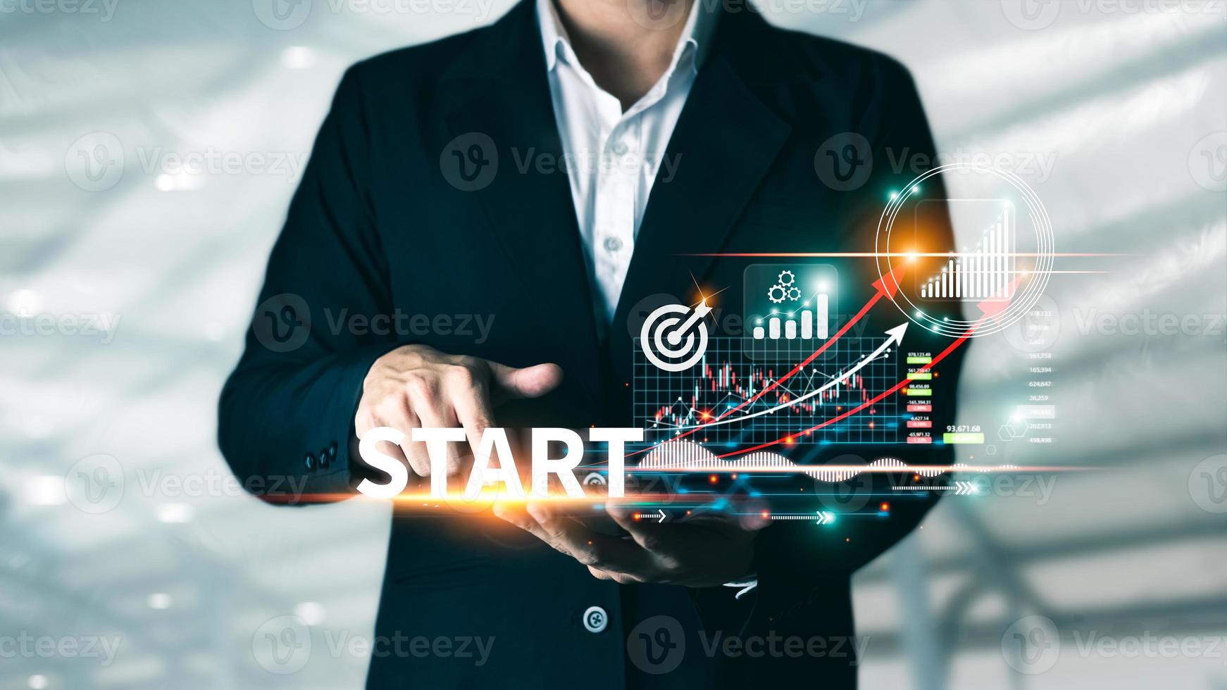 Concept of startup business to be successful, Businessman touch tablet screens, business icons and network connections on global modern interface. photo