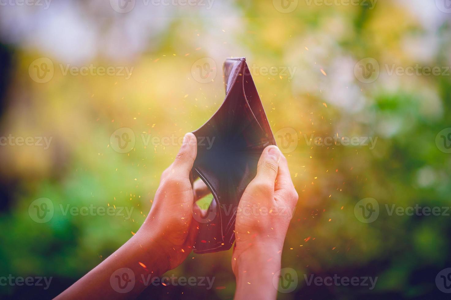 Dollar hand and purse images Concept of business finance photo