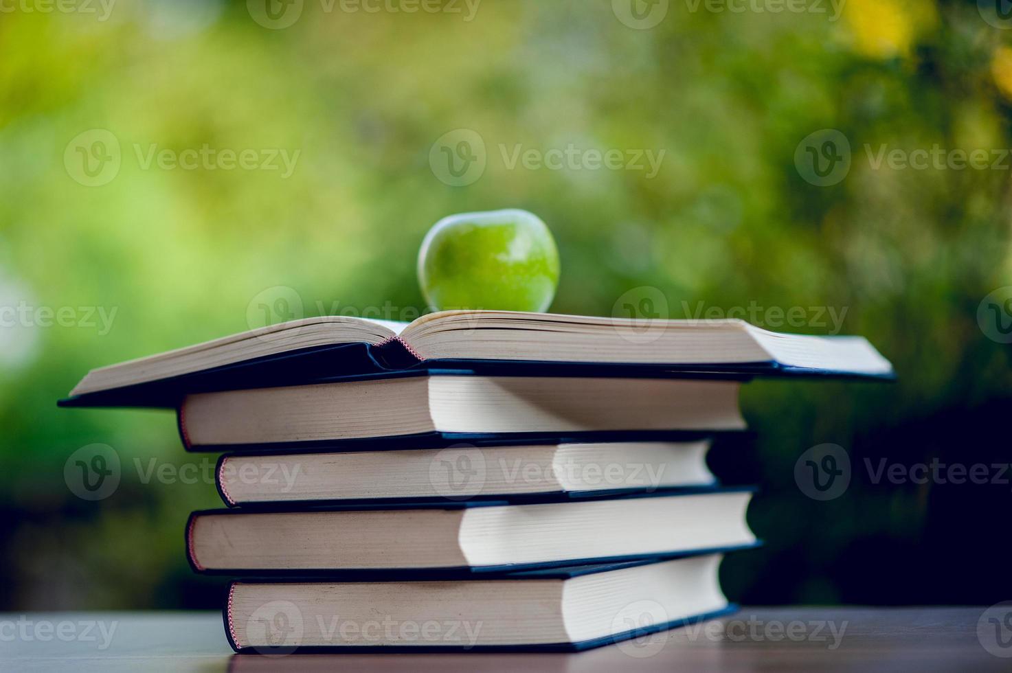 Picture of books and educational equipment placed on the table Educational concept with copy space photo