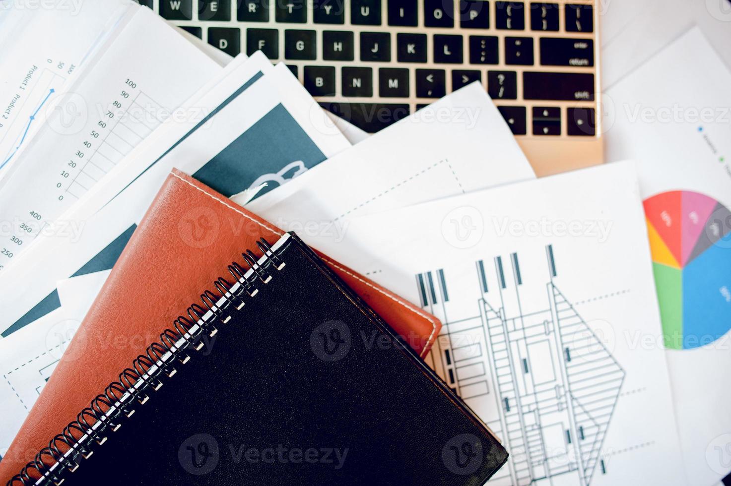 The desk and graph are placed on the business desk. Business concept With copy space photo