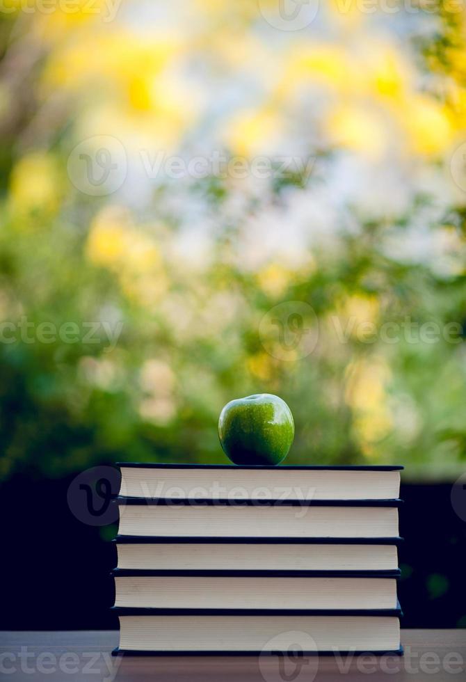 Picture of books and educational equipment placed on the table Educational concept with copy space photo