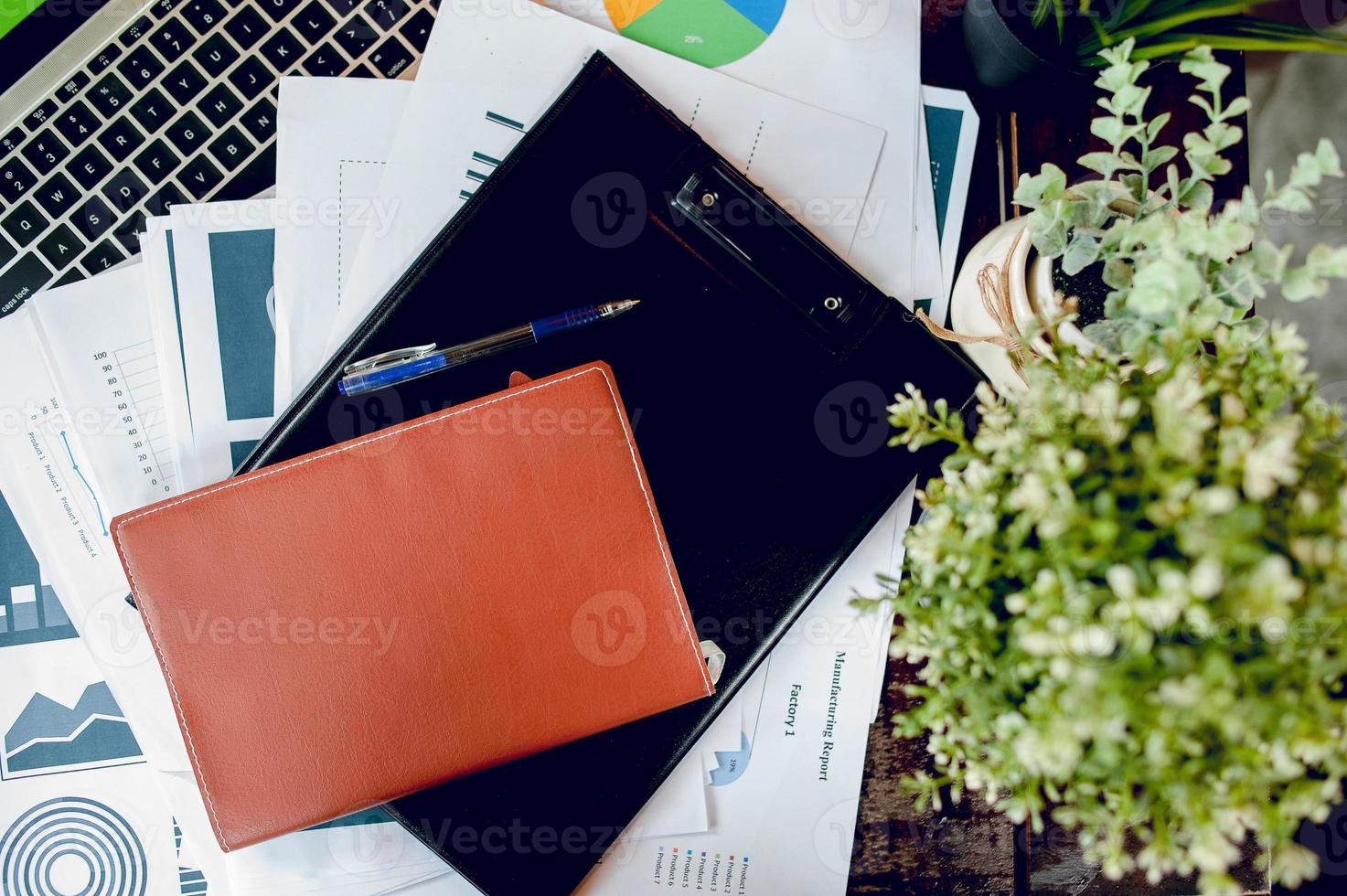 The desk and graph are placed on the business desk. Business concept With copy space photo