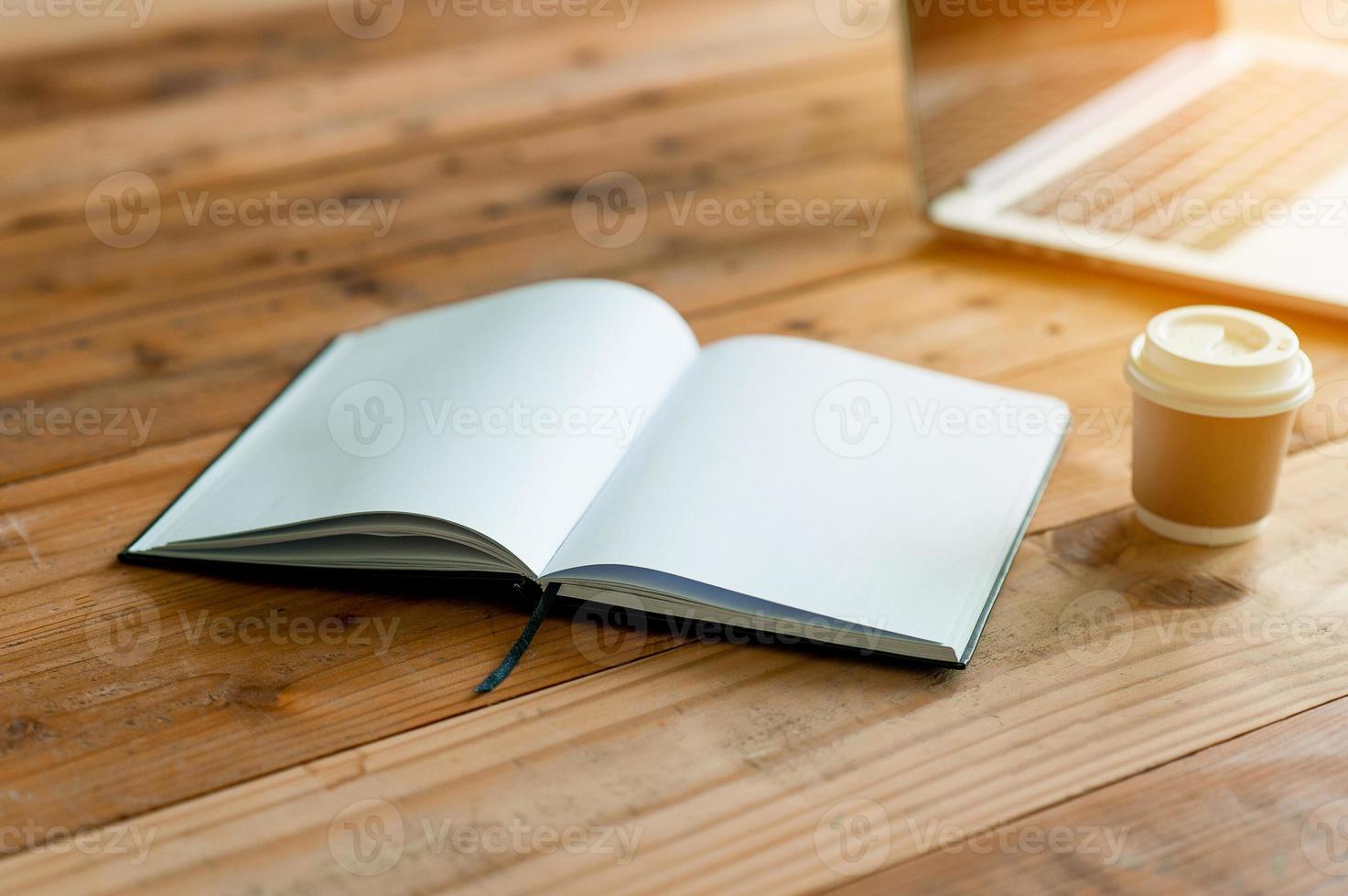 A desk with a business computer and a note on the desk. Business concept with copy space. photo