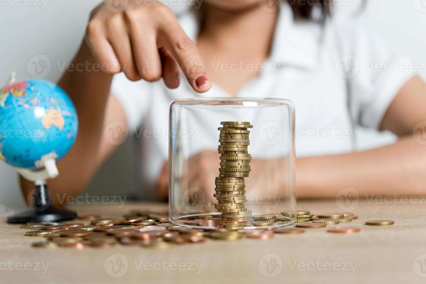 Pictures of hands and money of businessmen on the desk. Saving ideas with copy space. photo