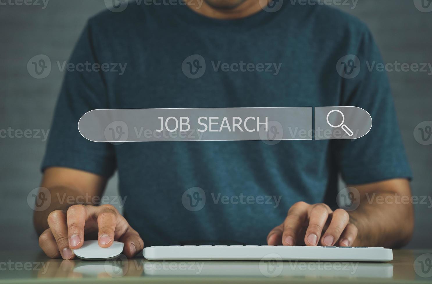 Businessman searching browsing internet jobs with blank search bar. Search engine optimization SEO networking concept. businessman working with computer laptop on desk in office. photo