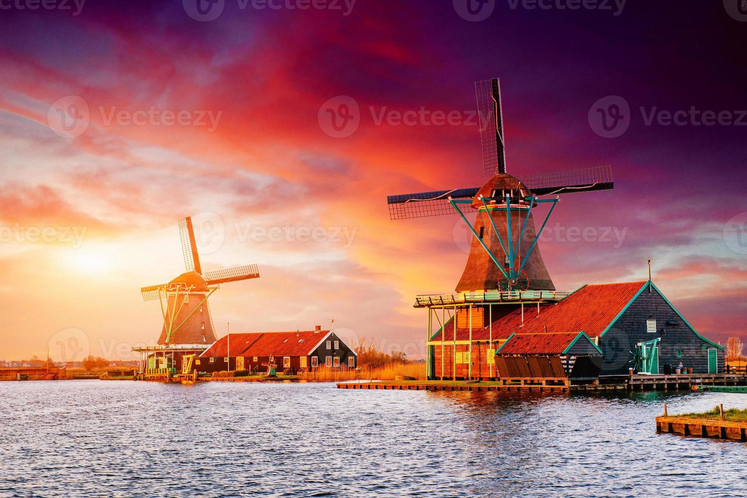 Traditional Dutch windmills from the channel Rotterdam. Holland photo