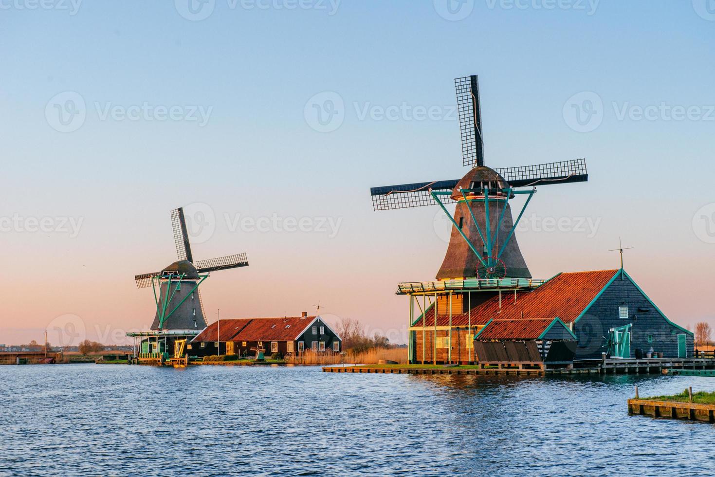 Traditional Dutch windmills from the channel Rotterdam. Holland photo