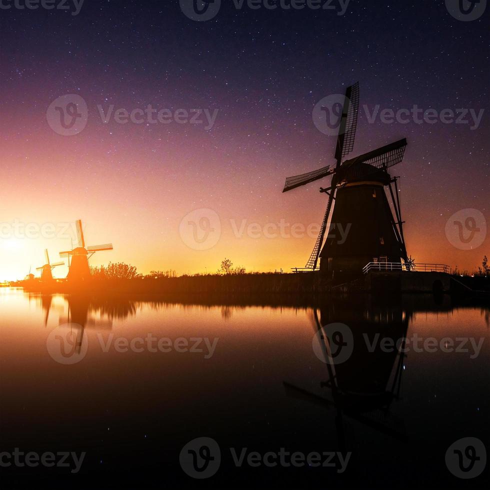 Dutch mill by night. Holland photo