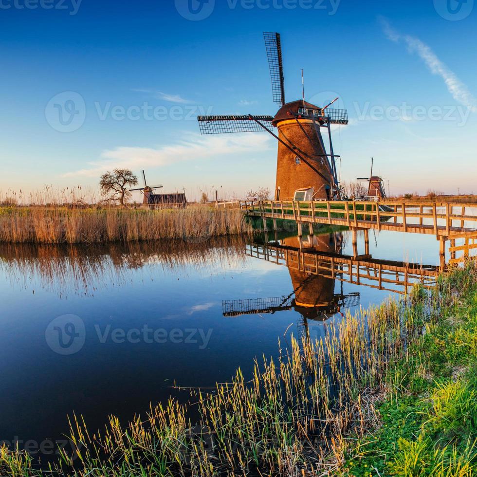 Traditional Dutch windmills from the channel Rotterdam. photo