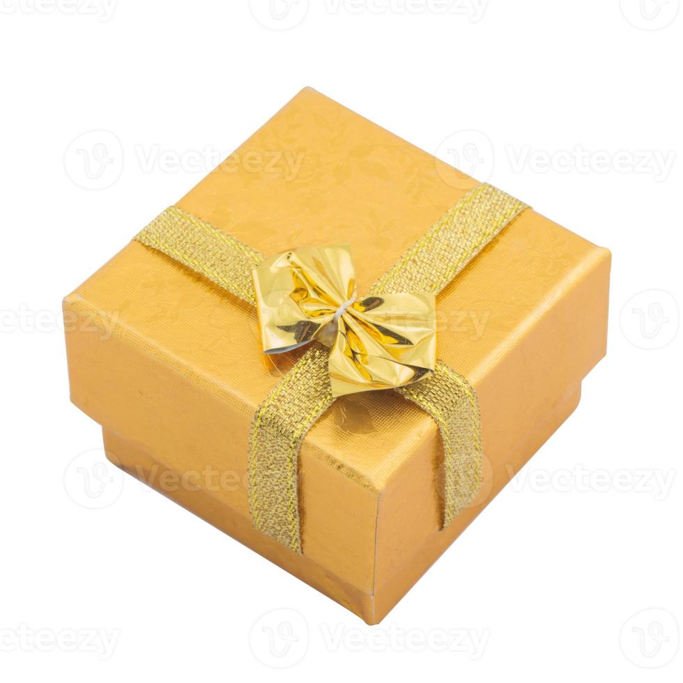 Gift box with gold ribbon bow isolated on white photo