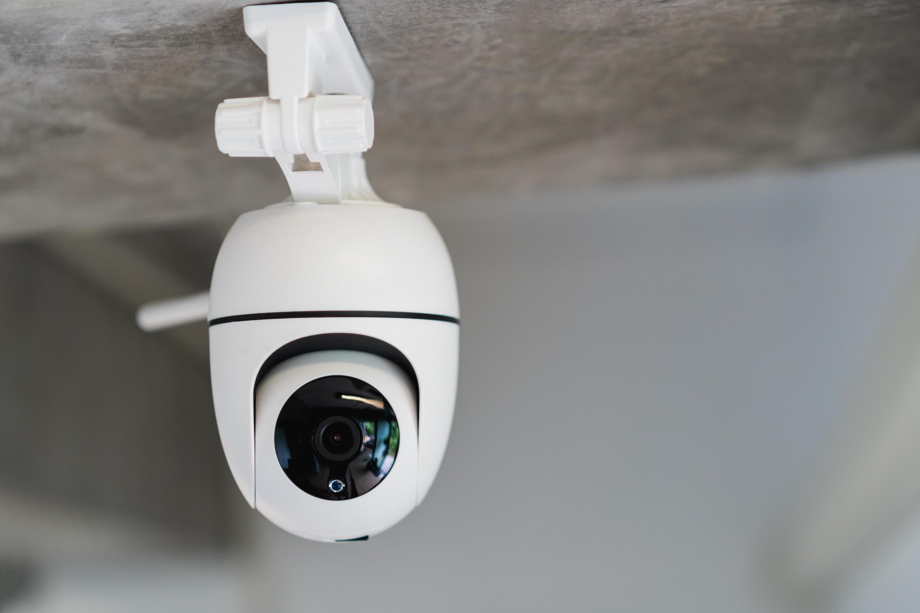 Security white CCTV Closed circuit television camera in the office