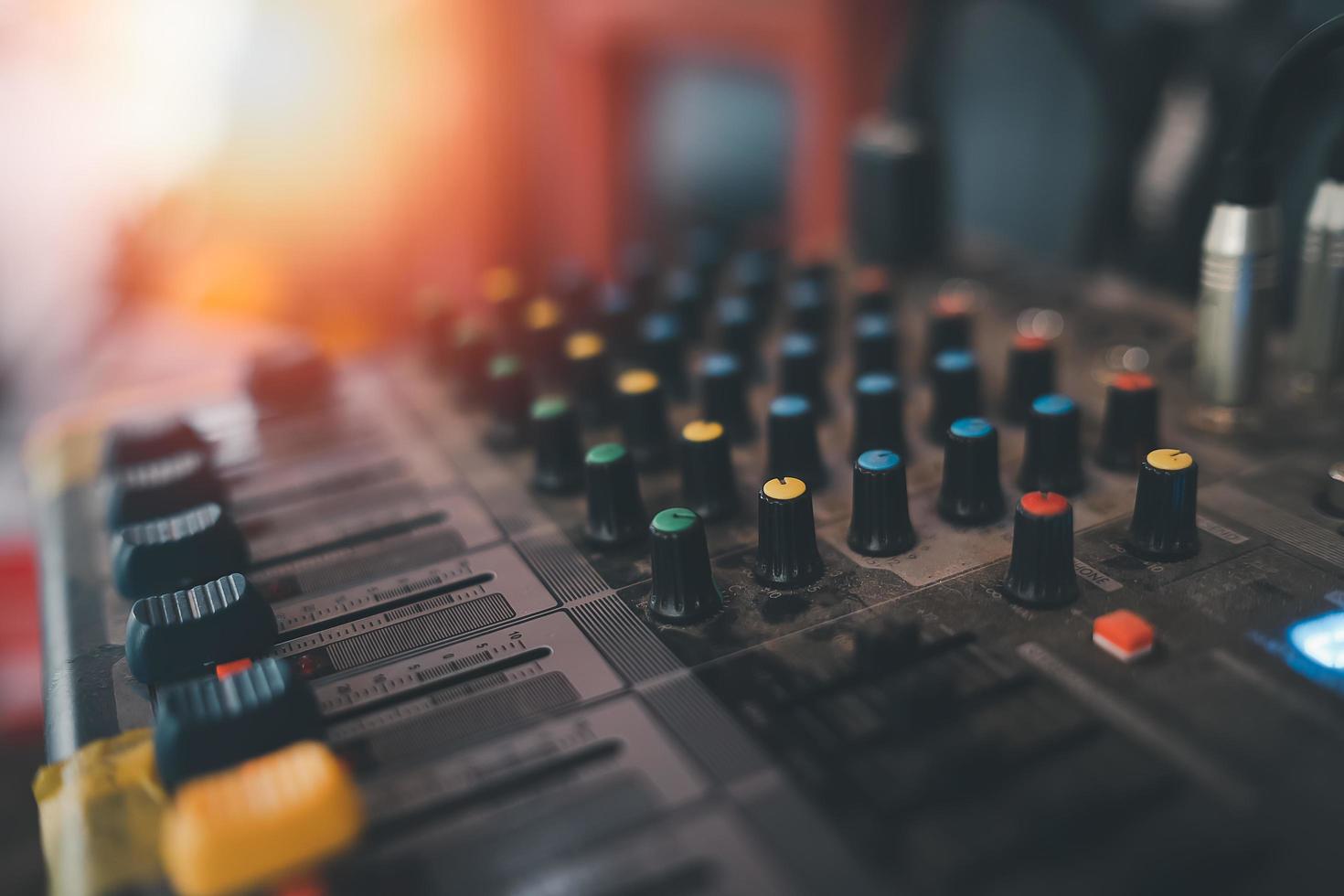 Audio music mixer. Digital sound equipment. Studio radio mixing.  Professional equalizer for concert mix, volume control, electronic instrument. Broadcast switch. Record technology. photo