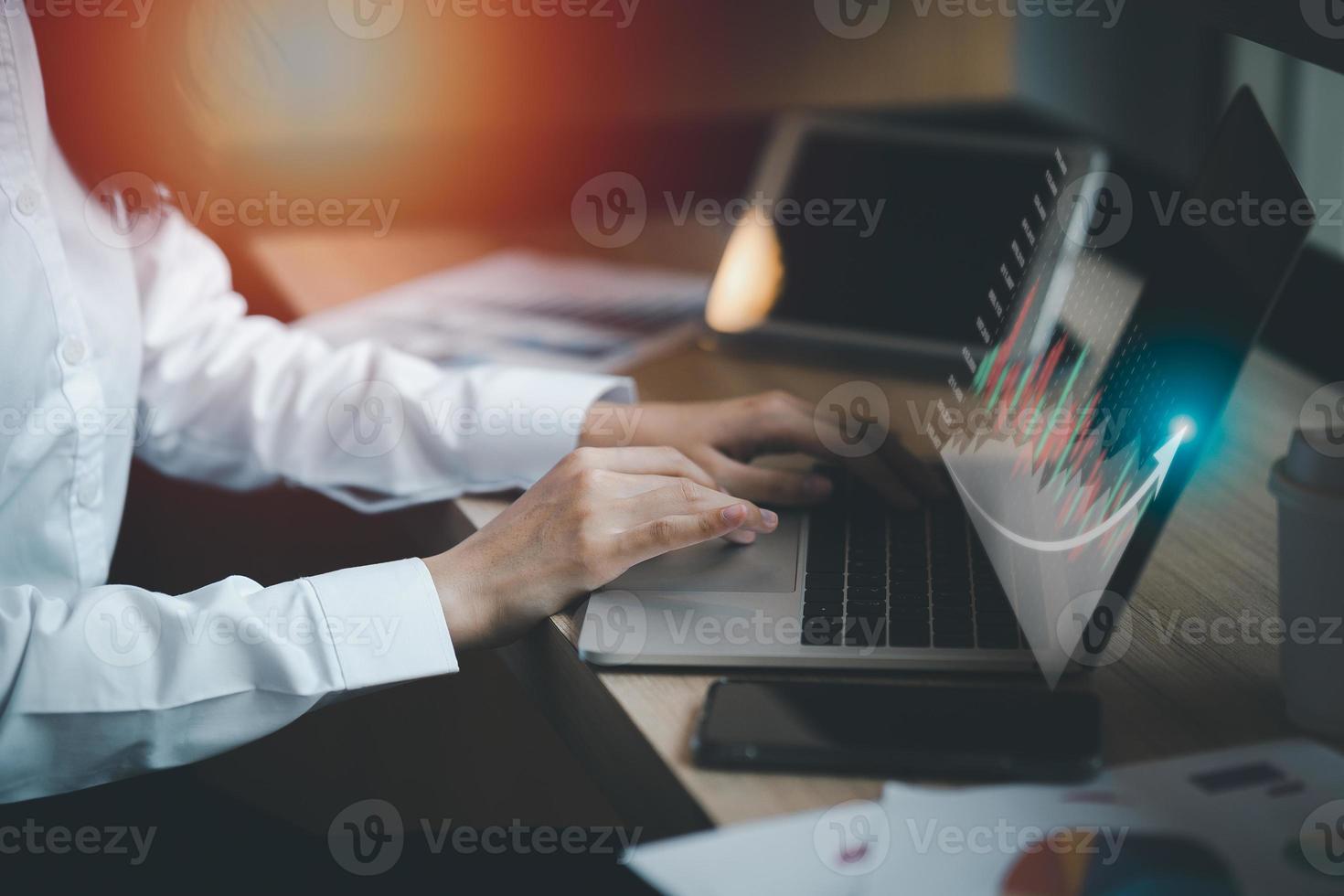 Business finance technology and investment concept. Business woman analysing forex and crypto currency trading graph. Stock market investments funds and digital assets. photo