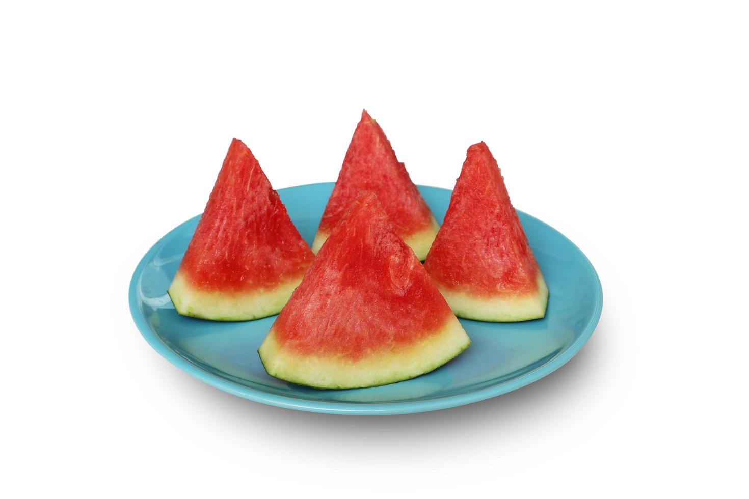 Slice of watermelon in blue dish isolated on white background with clipping path. photo