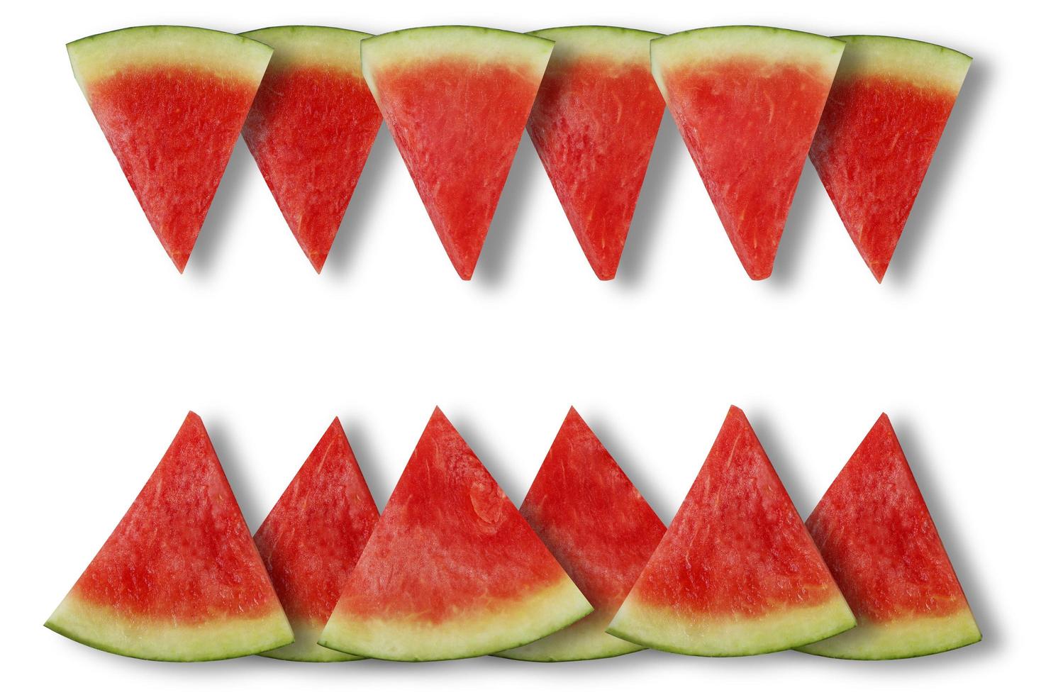 Watermelon slices on a white background with copy space. photo
