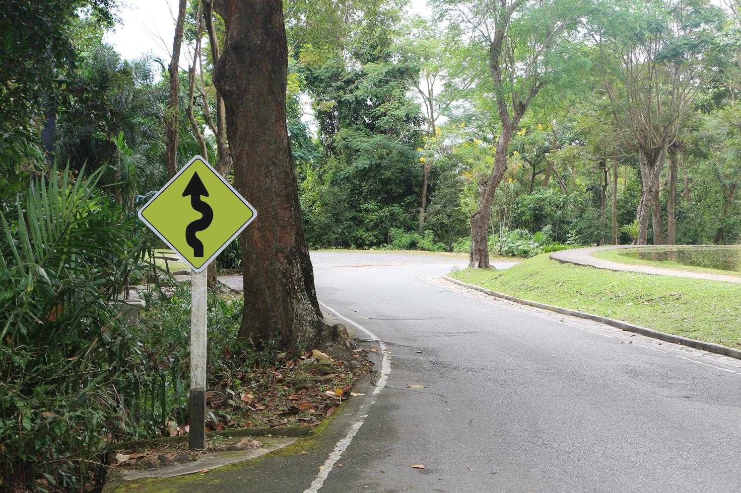 S-shaped curve traffic signs for vehicles. Symbol for dangerous road. photo