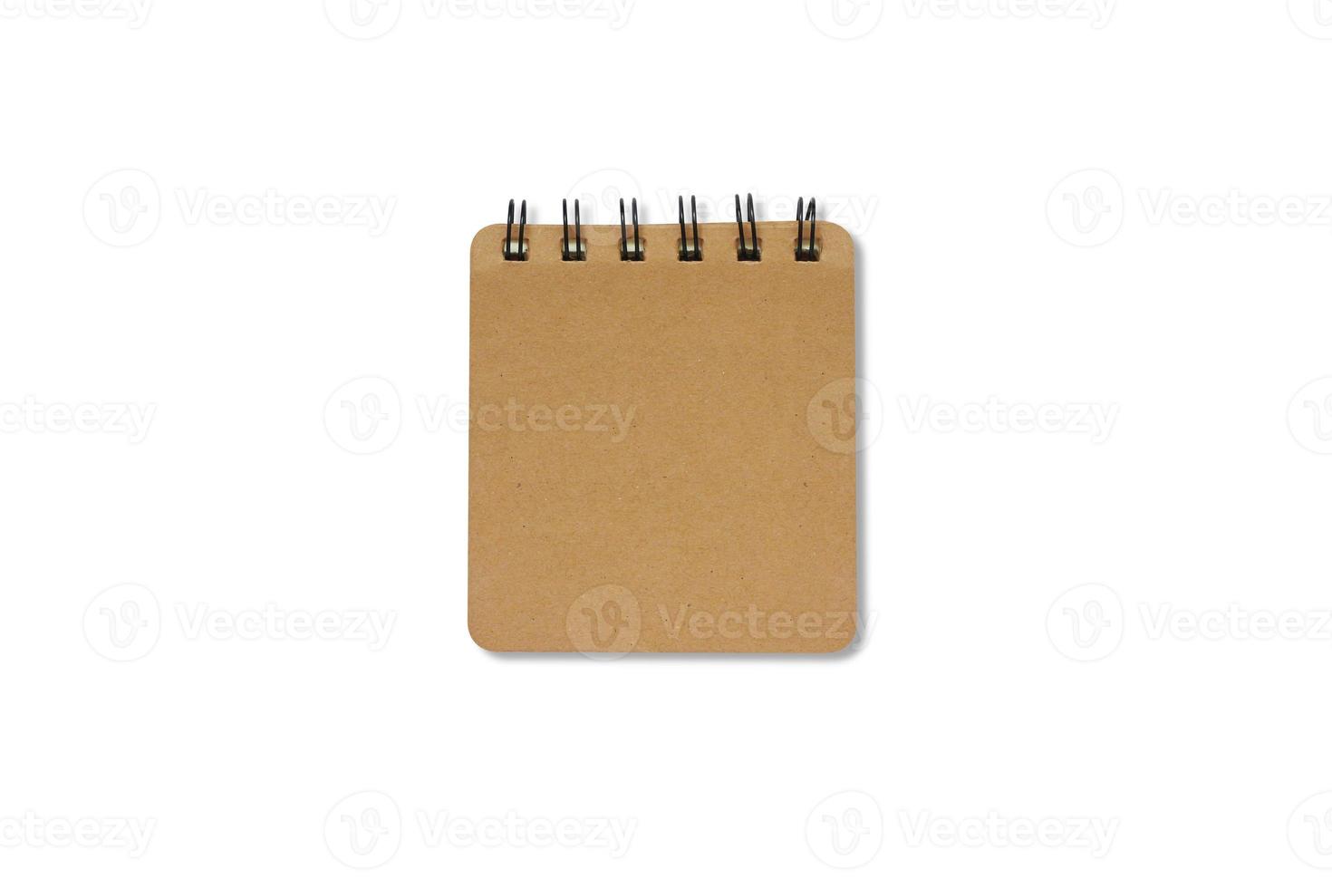 Brown hardcover notebook with a black loop. Blank book isolated on white background with clipping path. Top view. photo