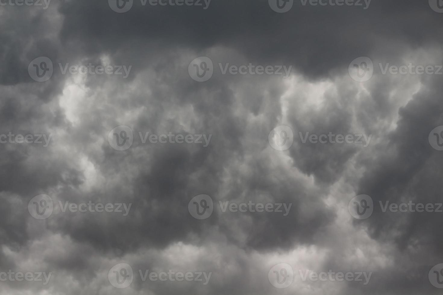 Raincloud background. The sky was covered with black clouds. photo