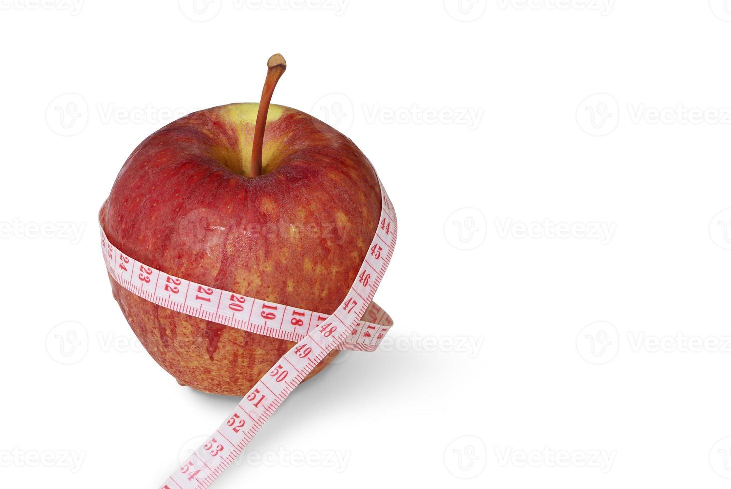 Apple with tape measure isolated on white background with clipping path. Healthcare and medical concept. photo