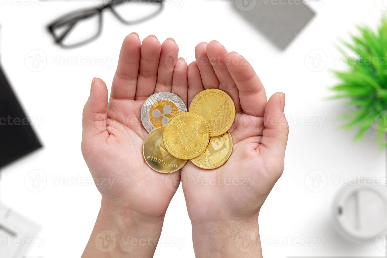 Crypto gold coins in hands photo