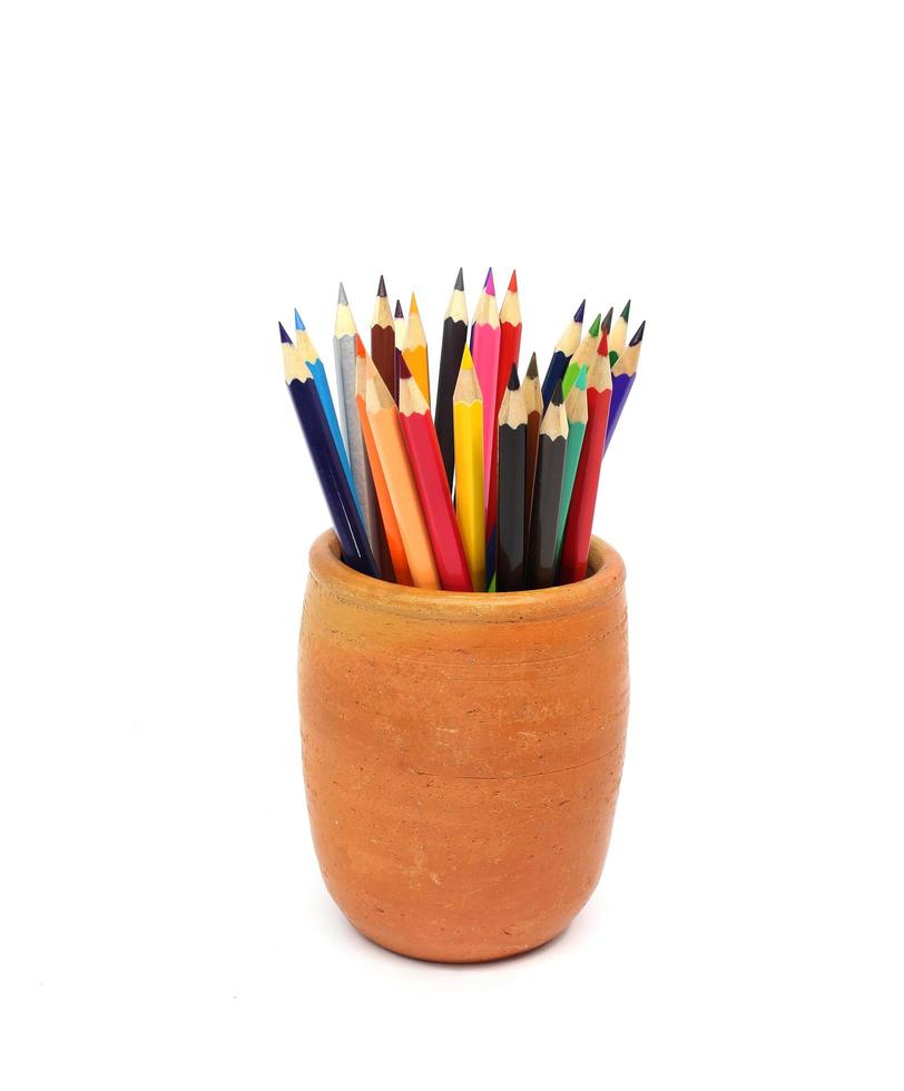 Color pencils in clay pots photo