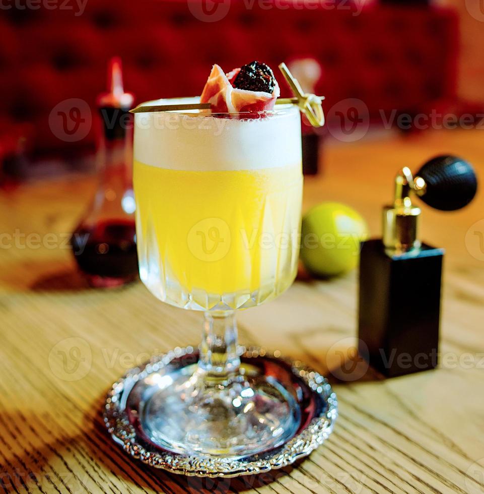 alcohol cocktail on the table in the bar photo