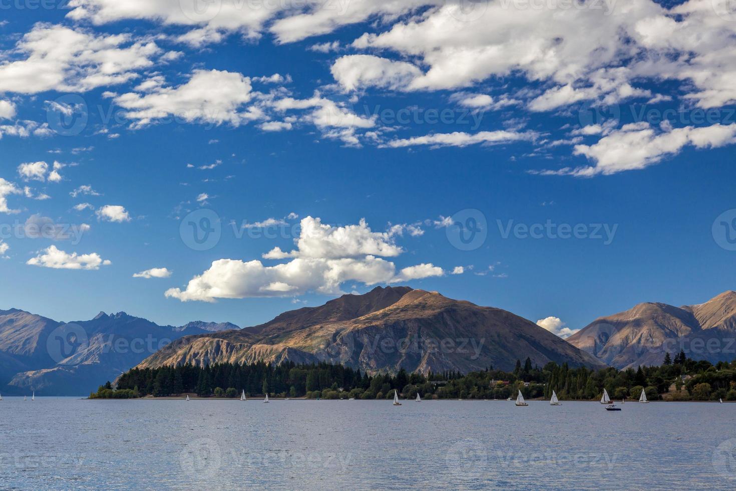 Sailing on Lake Wanaka in the Otago Region of New Zealand photo