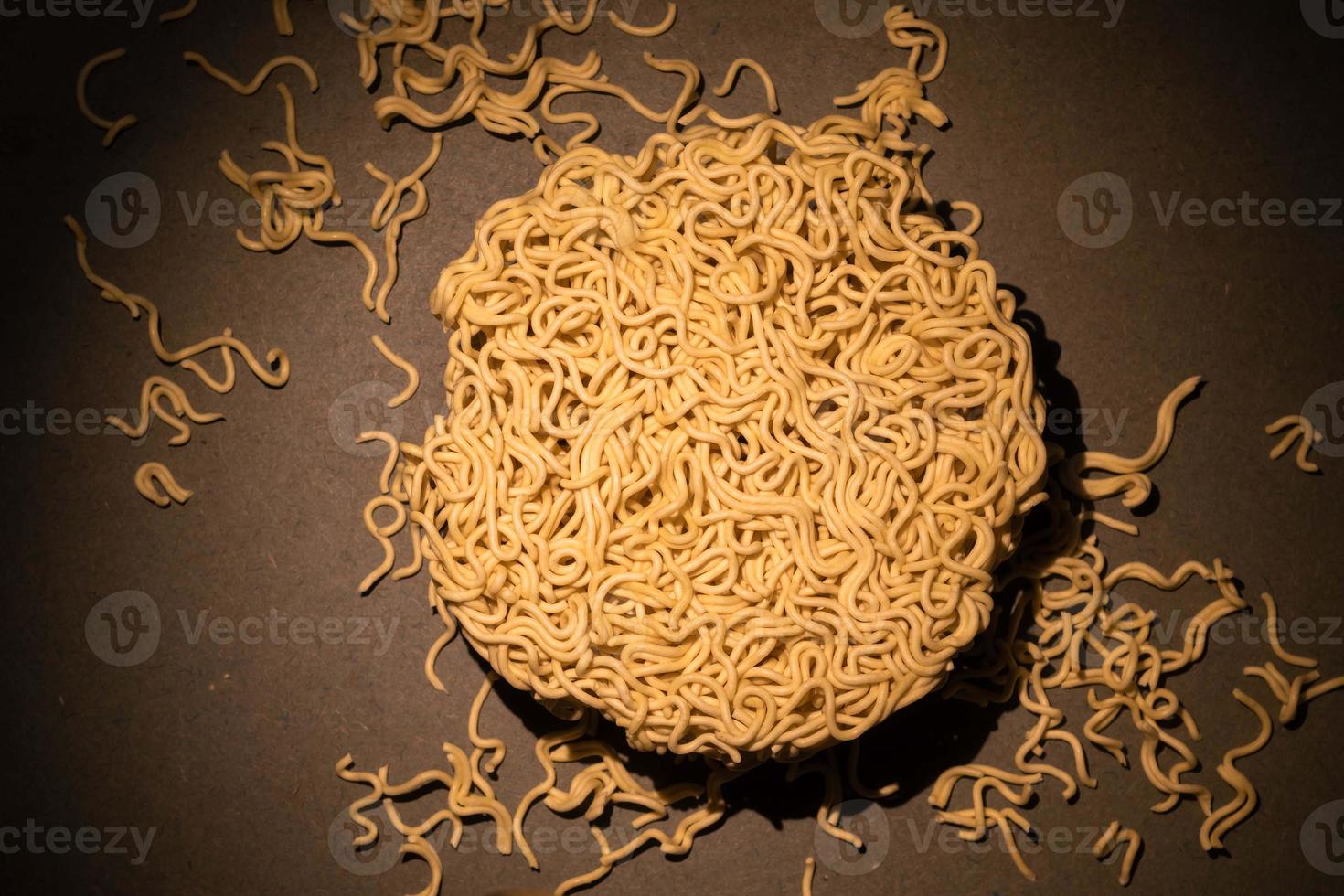 Asian food instant noodle on green wood table. photo