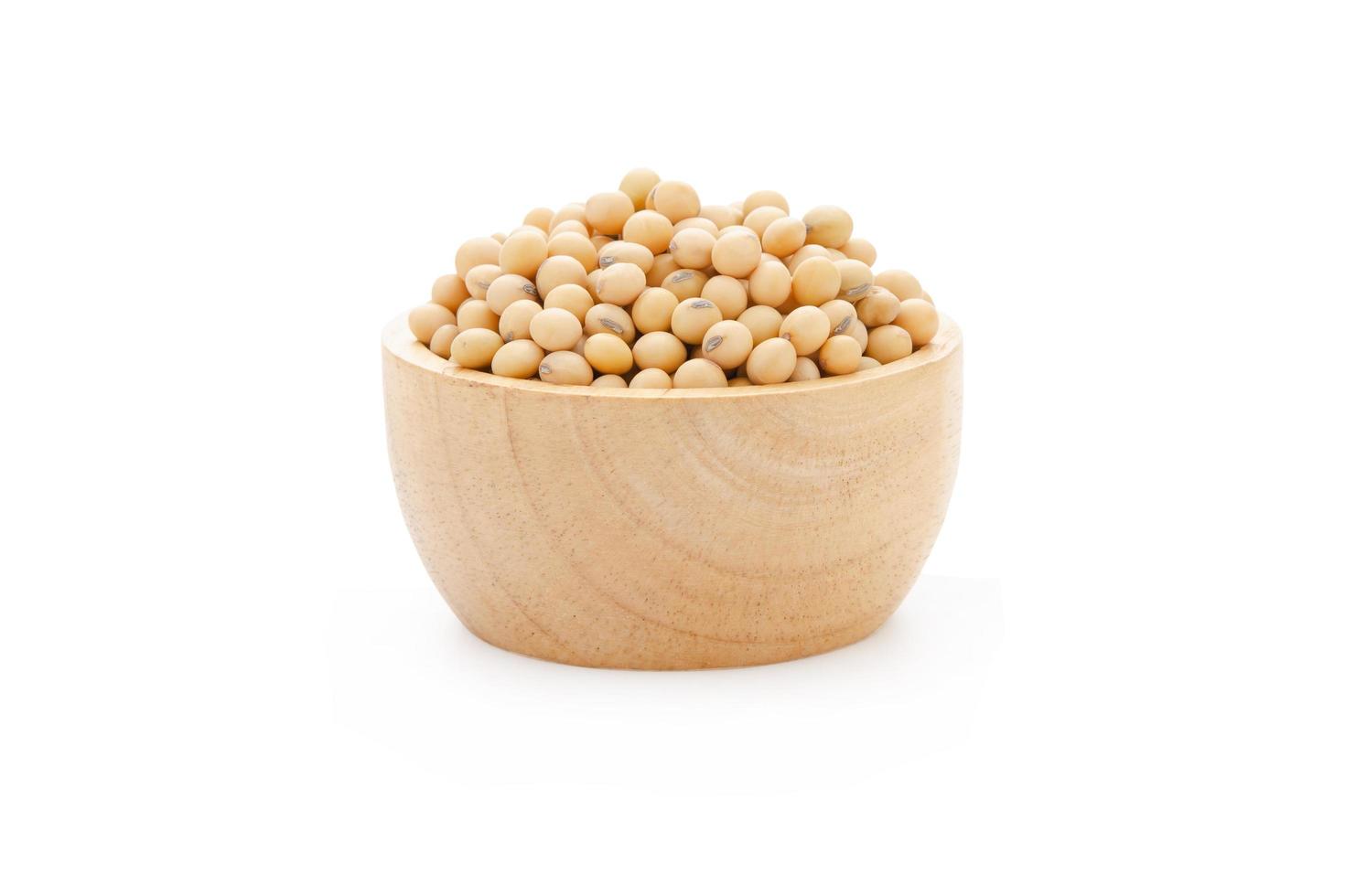 Soybeans in bowl wood isolated on white background with clipping path photo