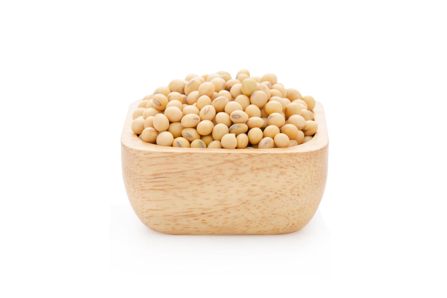 Soybeans in bowl wood isolated on white background with clipping path photo