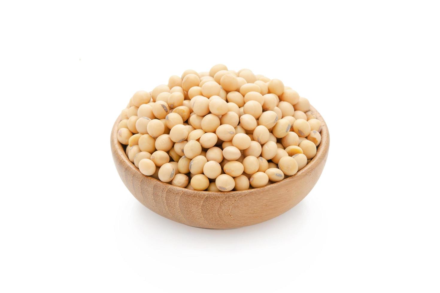 Soybeans in bowl wood isolated on white background with clipping path photo