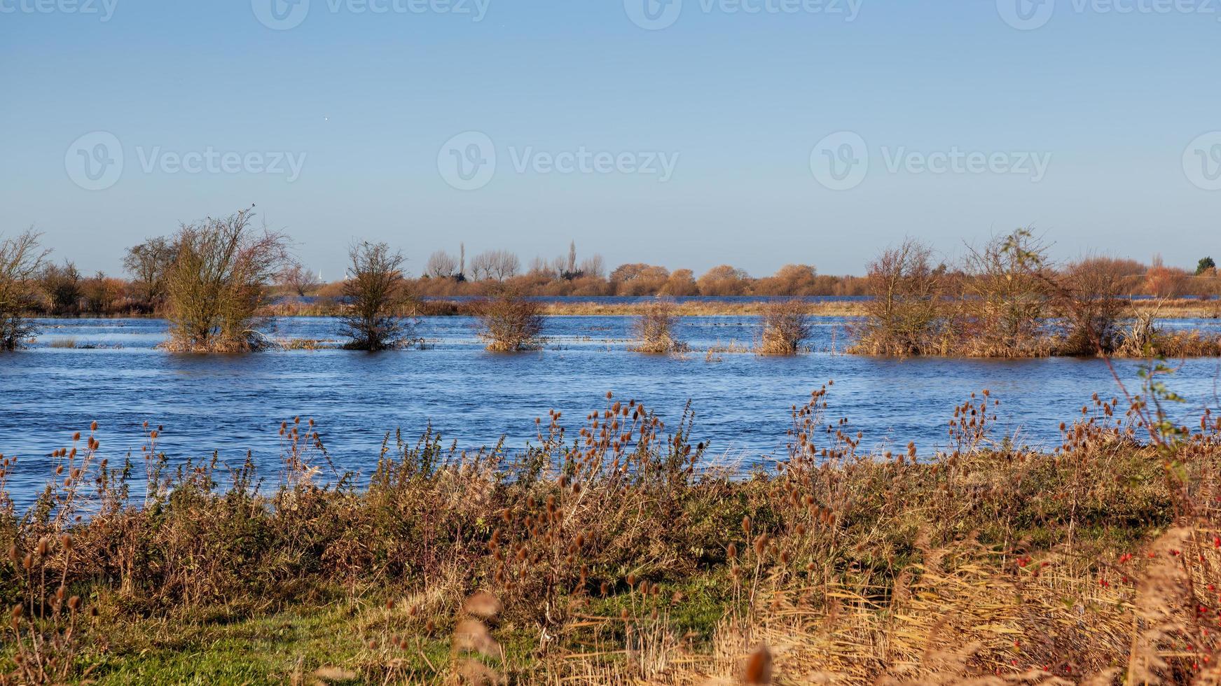 River nearly overflowing after heavy rain near Ely photo