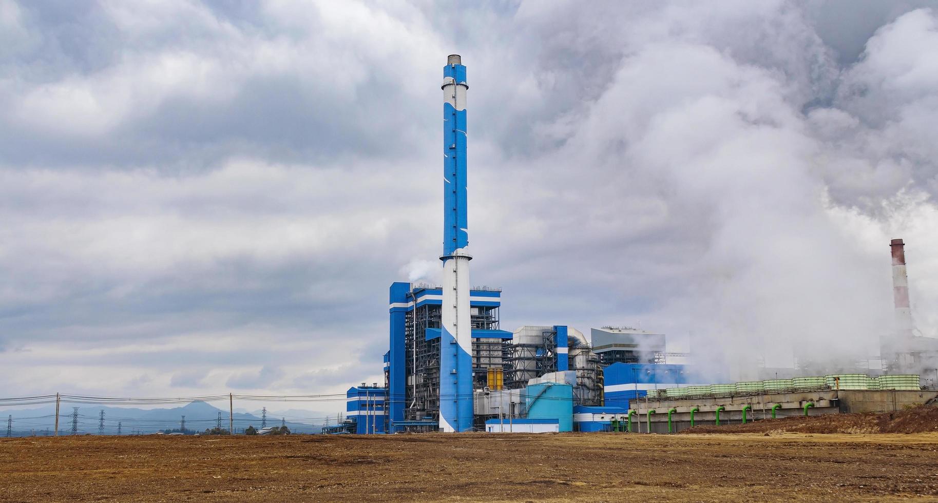 Power plant chimneys use lignite as fuel photo