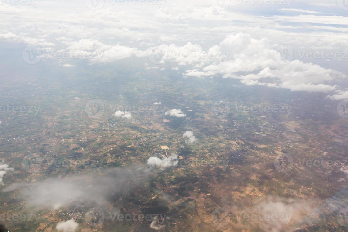 Blue sky with clouds on the airplane photo