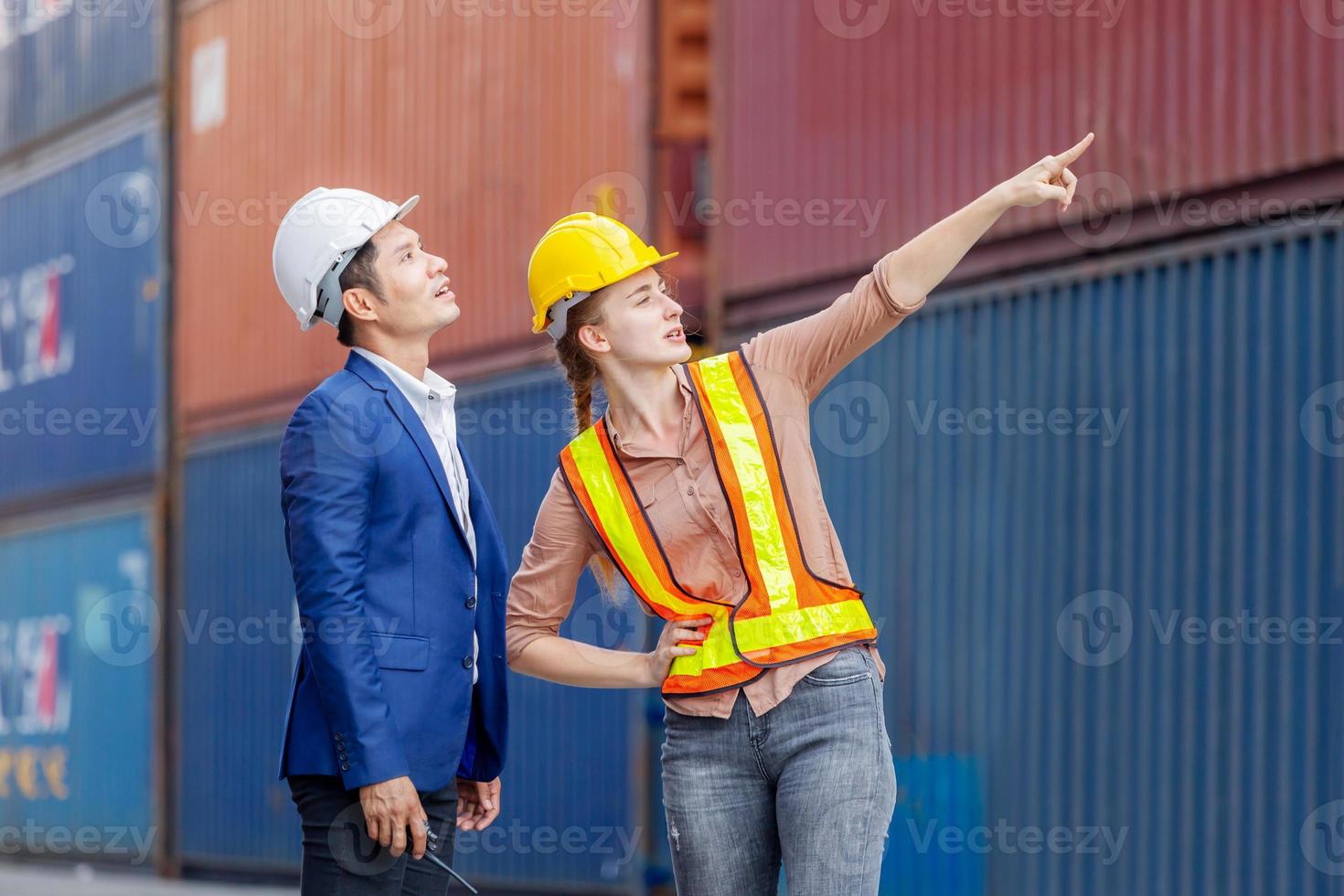 Engineer and worker team checking containers box from cargo, Logistic and teamwork concept photo