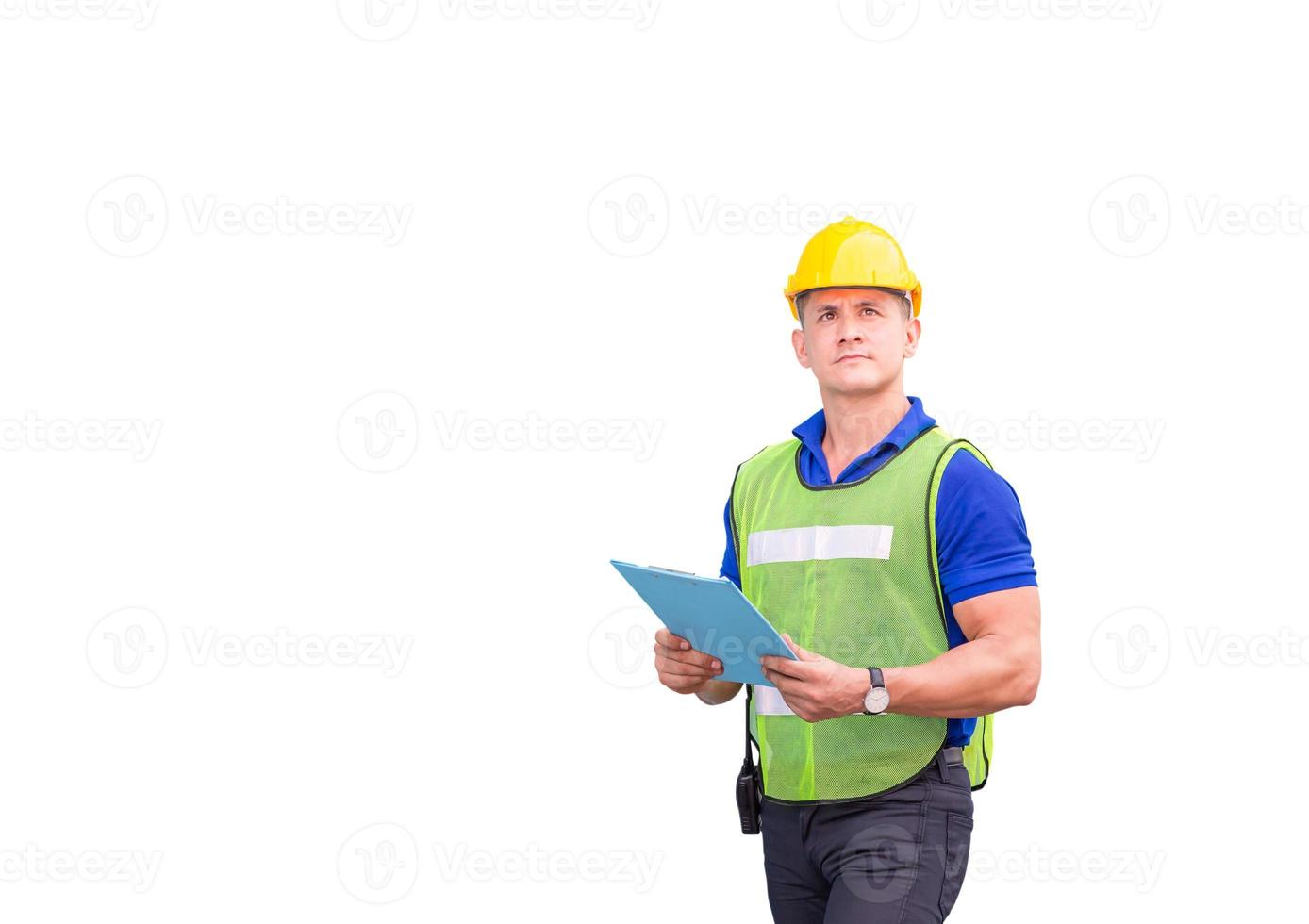 Factory worker with clipping path on white background, Engineer man in hardhat holding clipboard checklist smiling and looking to the sky photo