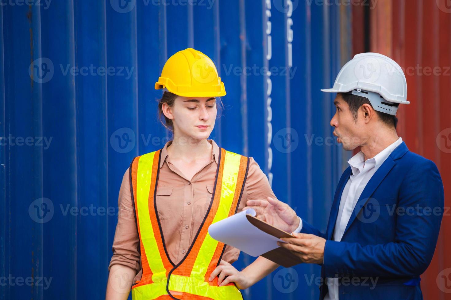 Engineer and worker team checking containers box from cargo, Logistic and teamwork concept photo